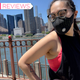 Woman wearing AirPop Active+ Halo Smart Mask in front of a river.